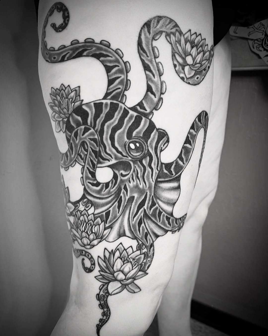 Tattoo by @the_slim_reaper_tattoo — black_and_grey