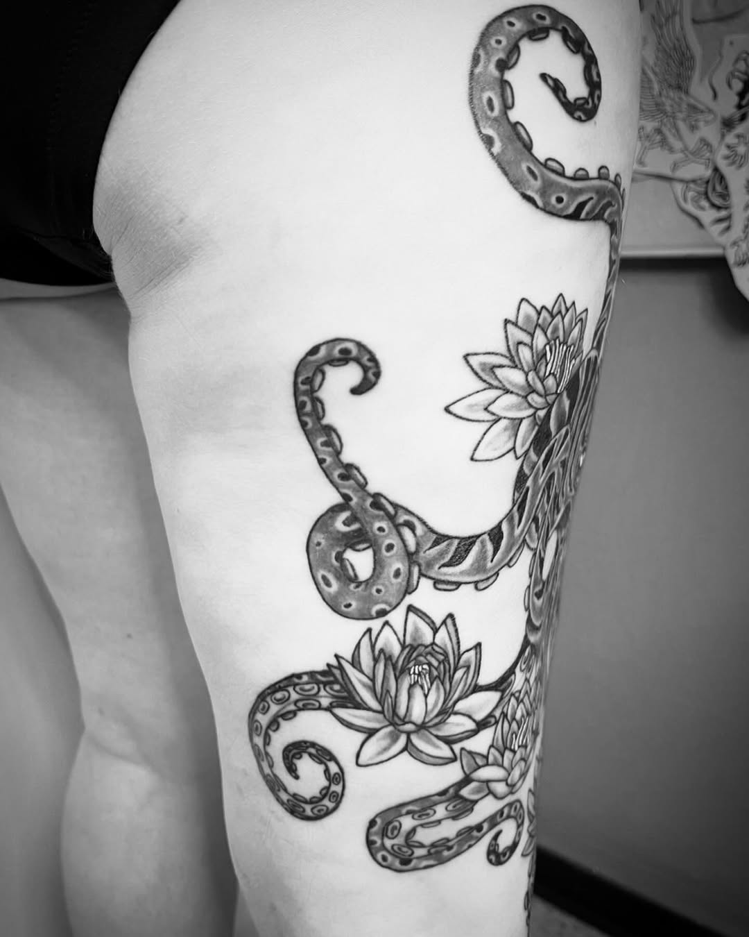 Tattoo by @the_slim_reaper_tattoo — black_and_grey