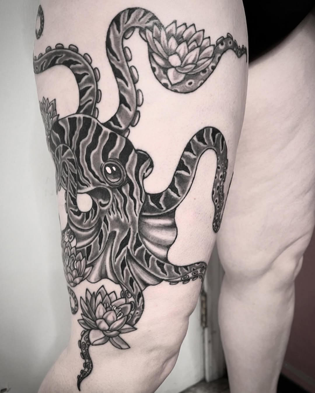 Tattoo by @the_slim_reaper_tattoo — black_and_grey