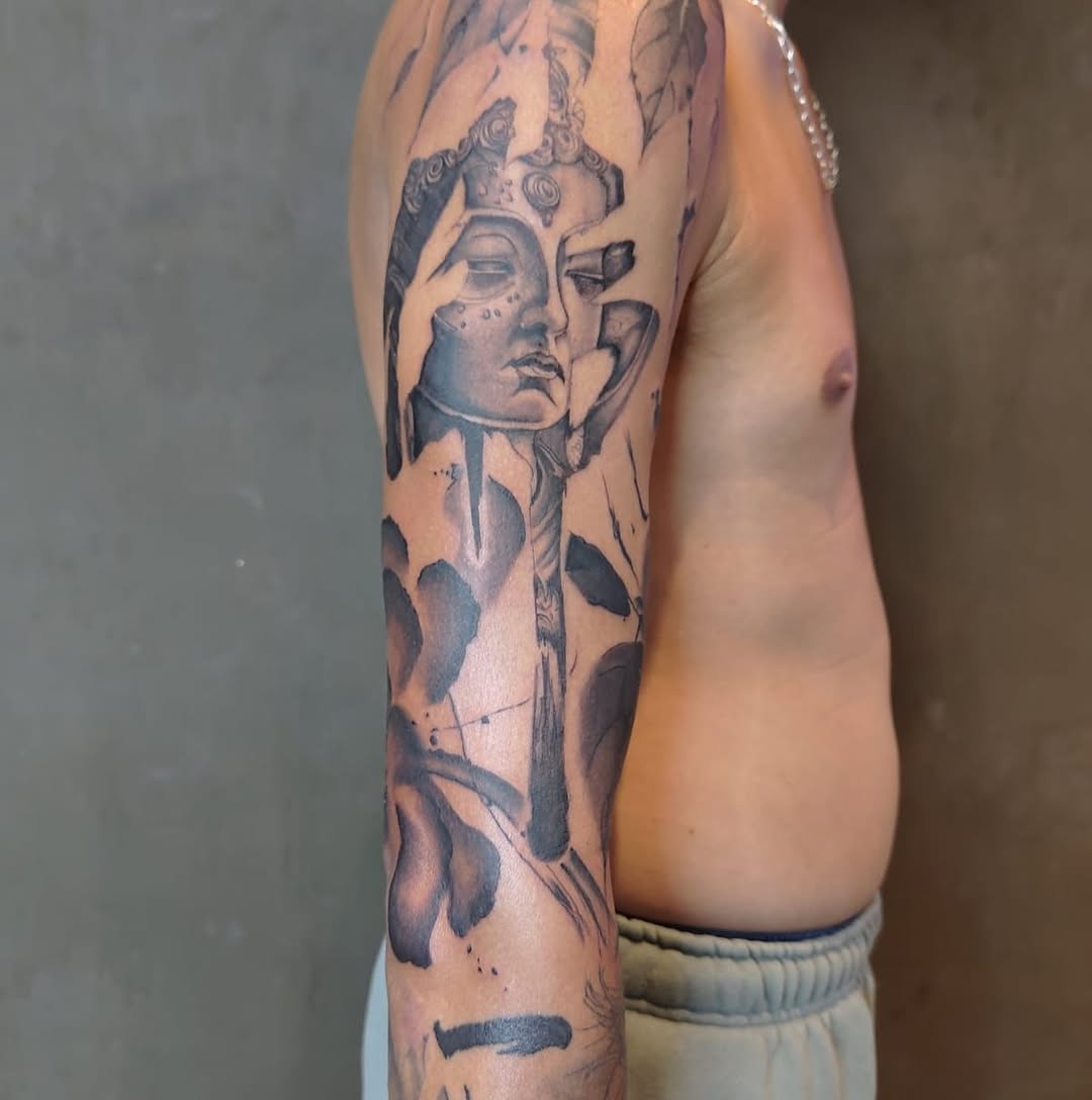 Tattoo by @alextwk.tattoo — black_and_grey, realism