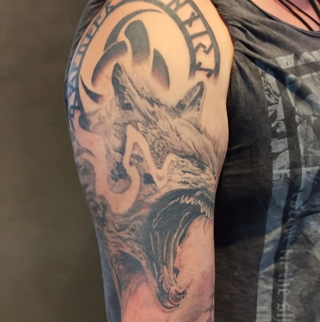 Tattoo by @alextwk.tattoo — black_and_grey, realism