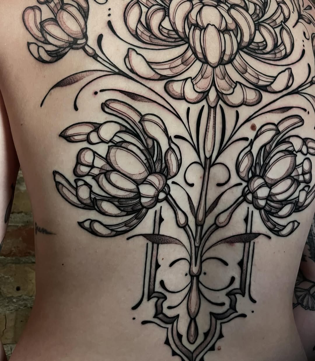 Tattoo by @strangegraves.ink — illustrative, black_and_grey