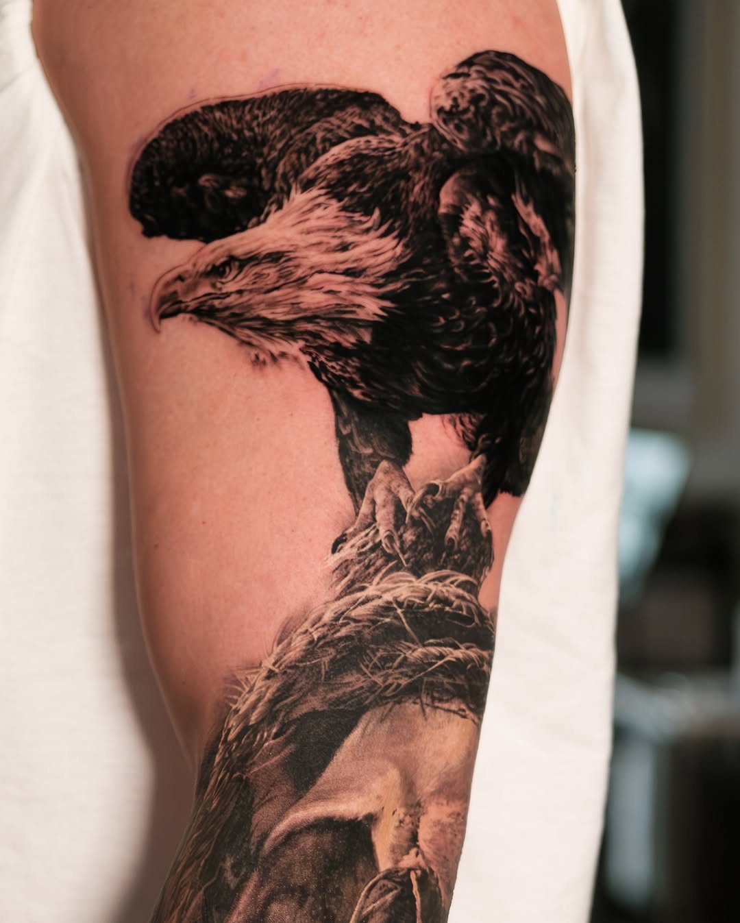 Tattoo by @chrispowelltattoos — realism, black_and_grey