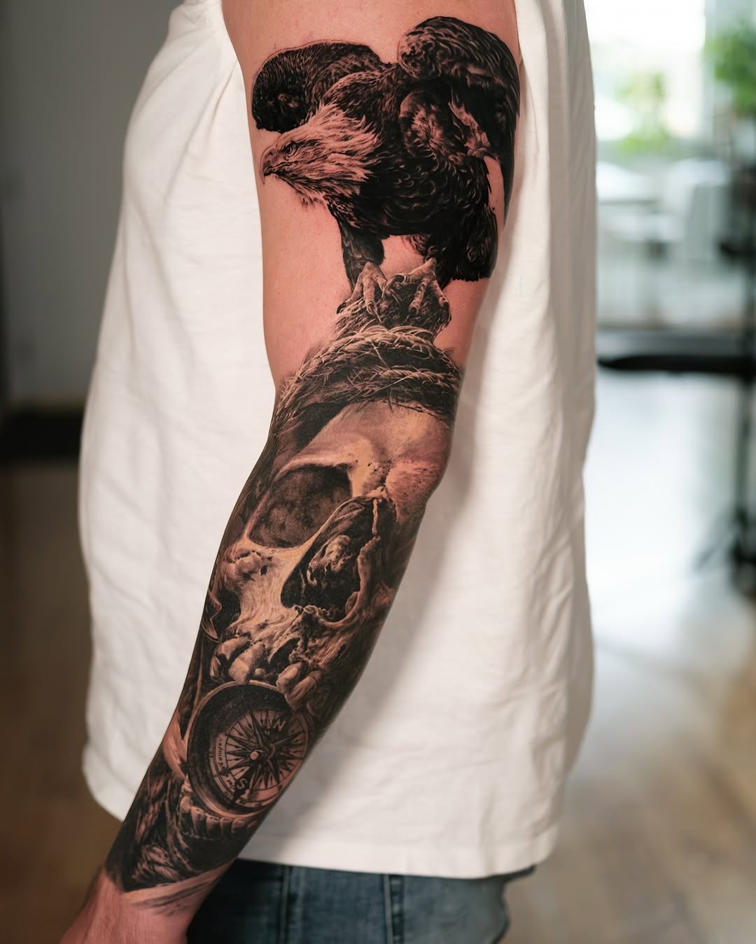 Tattoo by @chrispowelltattoos — realism, black_and_grey