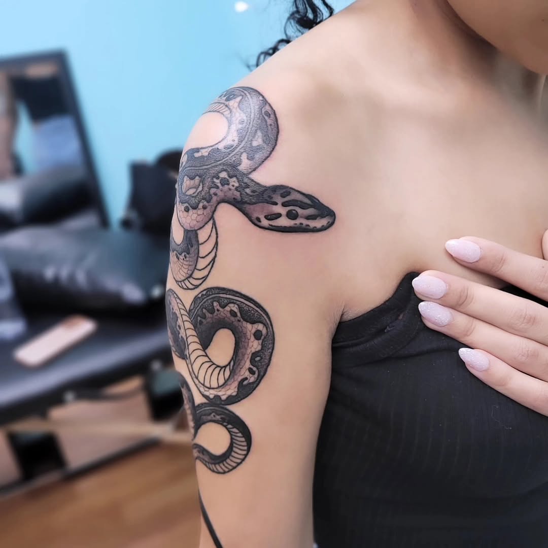 Tattoo by @tatsbykyra1 — realism, black_and_grey