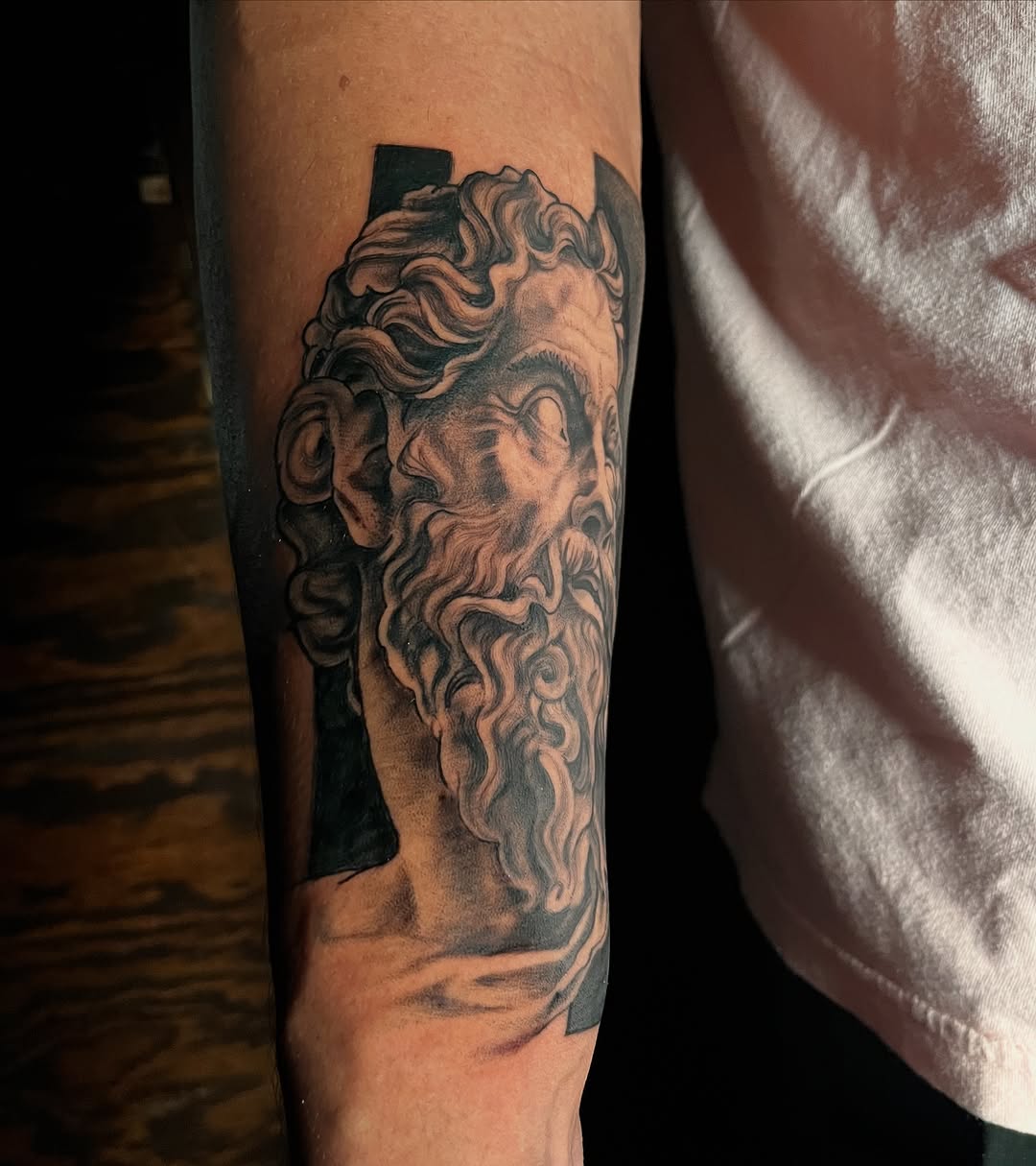Tattoo by @zurdtauroink — realism, black_and_grey
