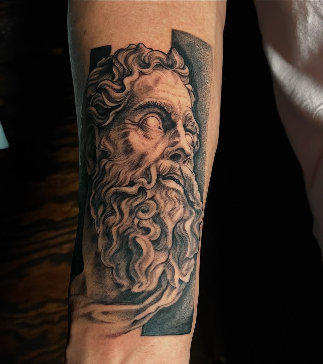Tattoo by @zurdtauroink — realism, black_and_grey