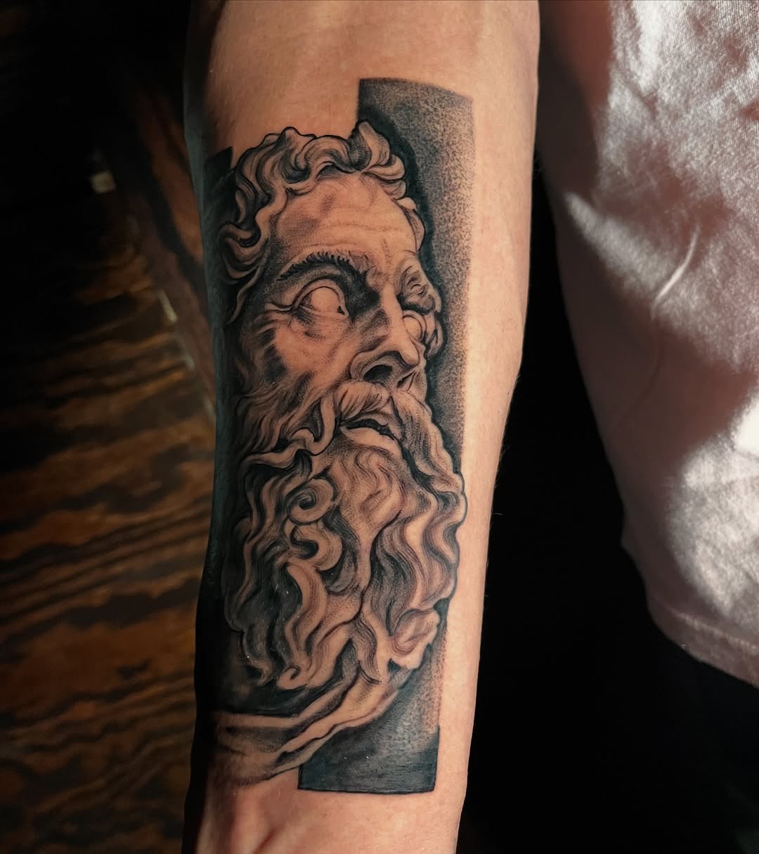 Tattoo by @zurdtauroink — realism, black_and_grey
