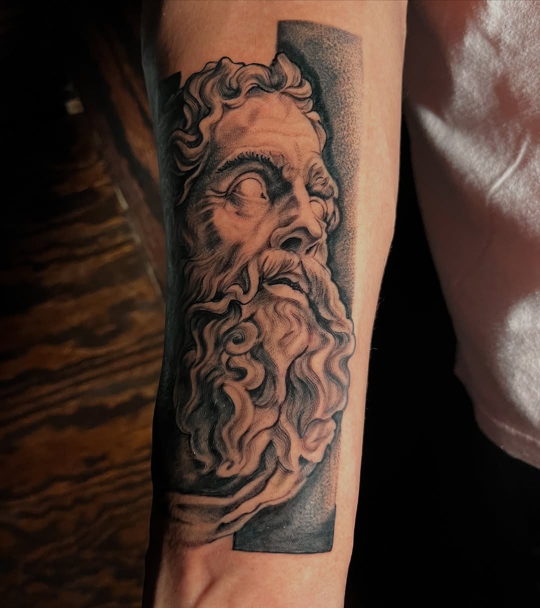 Tattoo by @zurdtauroink — realism, black_and_grey