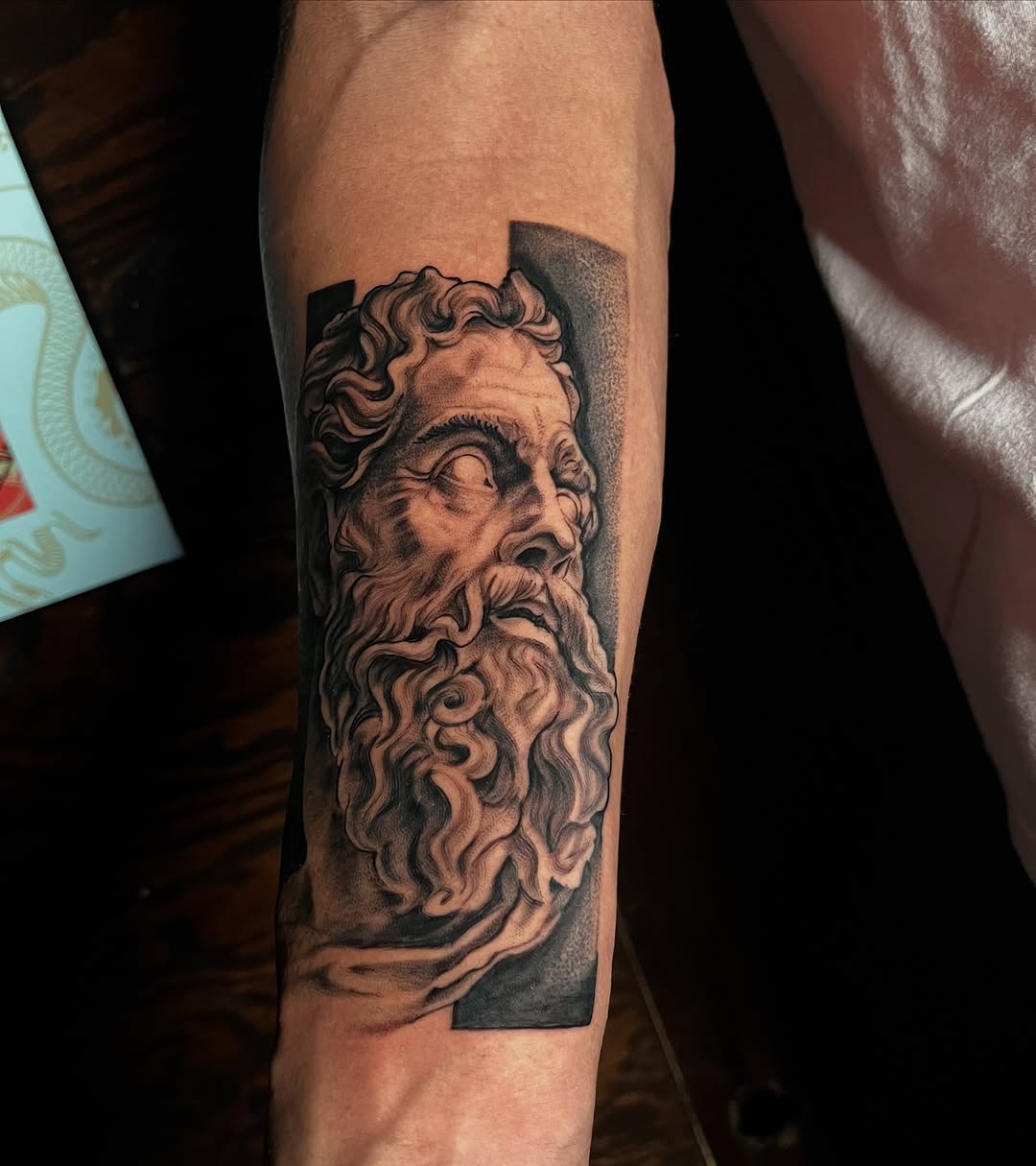 Tattoo by @zurdtauroink — realism, black_and_grey