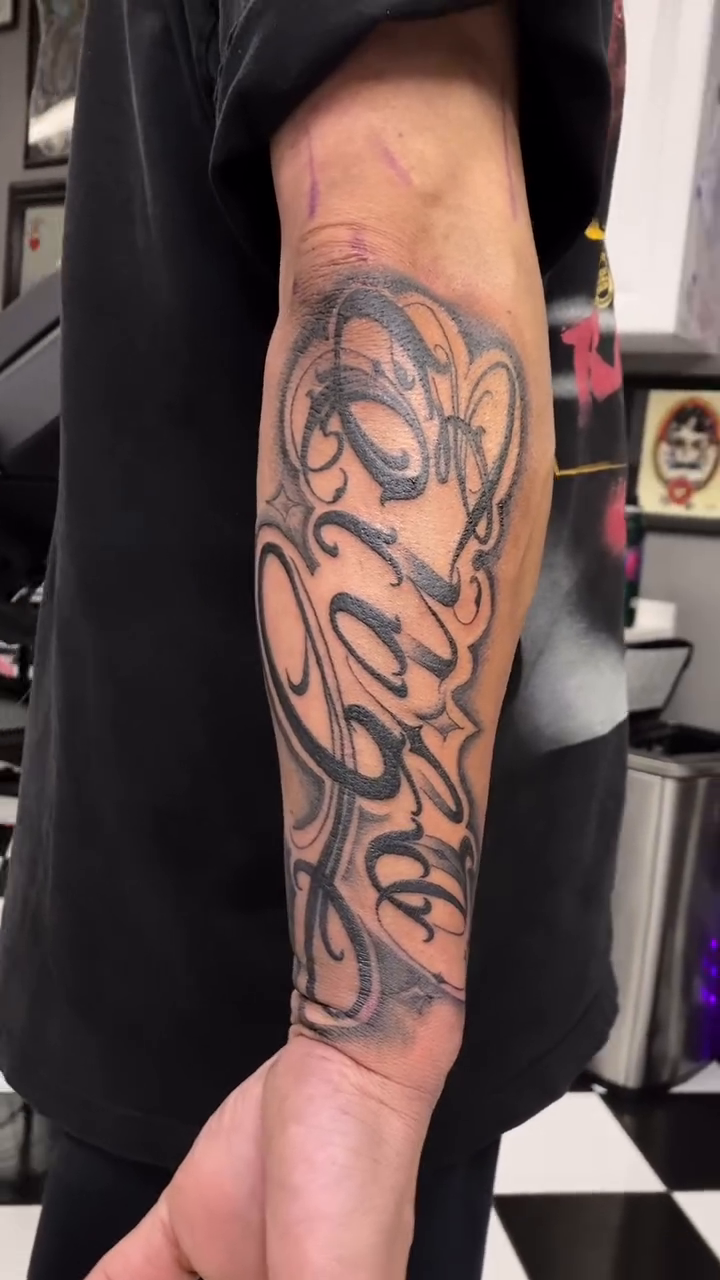 Tattoo by @sohl_tattoos β lettering_script, black_and_grey