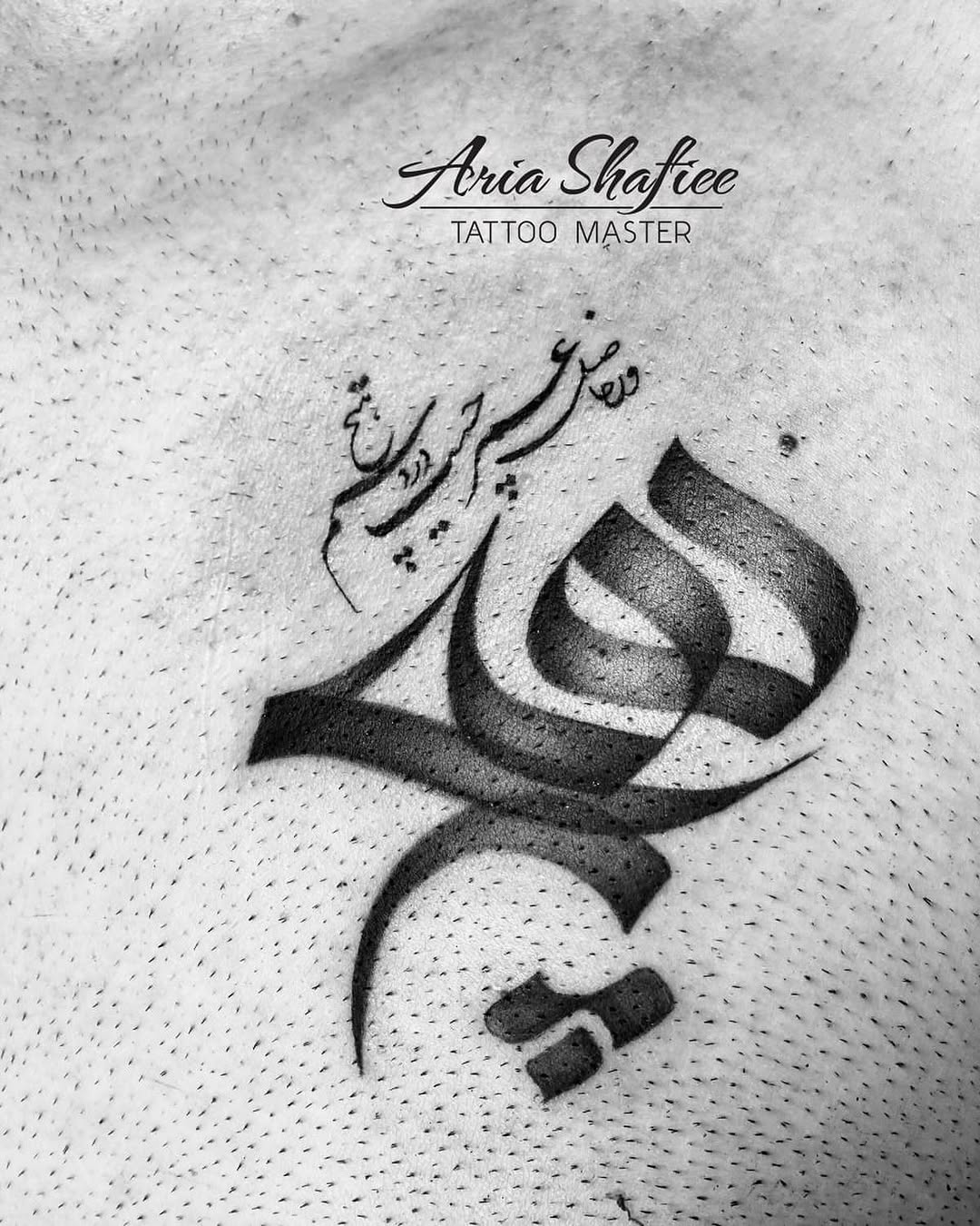 Tattoo by @ariu_tattoo — lettering_script, blackwork