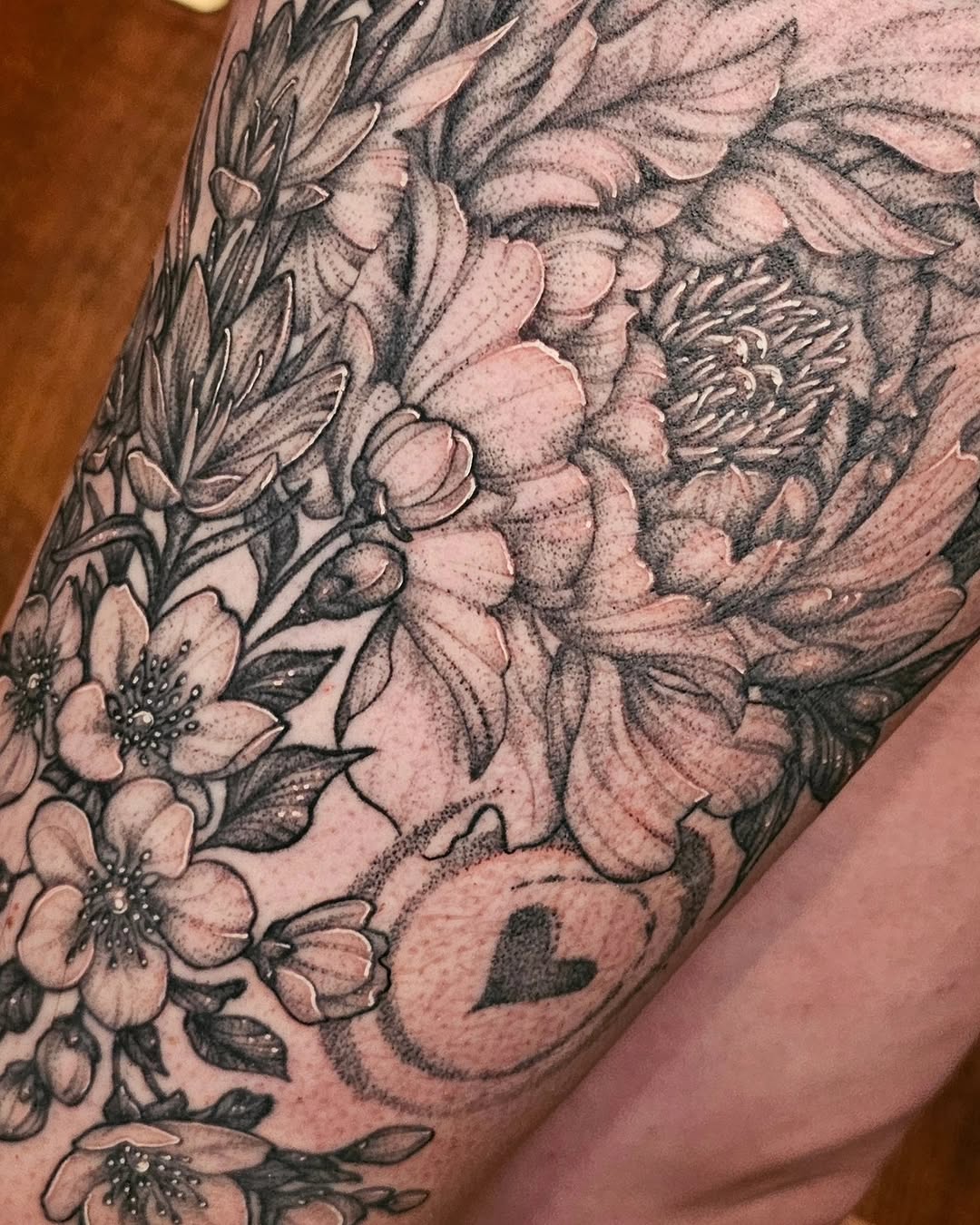Tattoo by @erinrietzetattoo — realism, dotwork