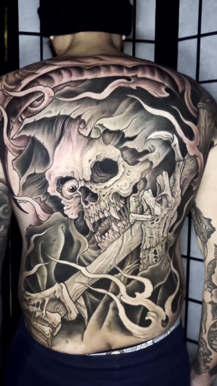 Tattoo by @nickcarusotattoo — dark_realism, black_and_grey