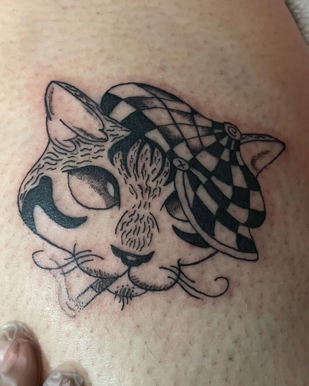 Tattoo by @oddn3n3 — illustrative, blackwork