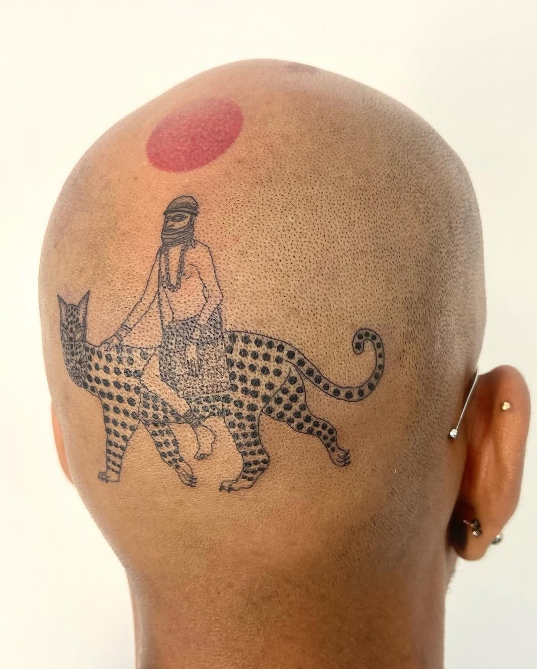 Tattoo by @geisha_ocelotl — illustrative, blackwork