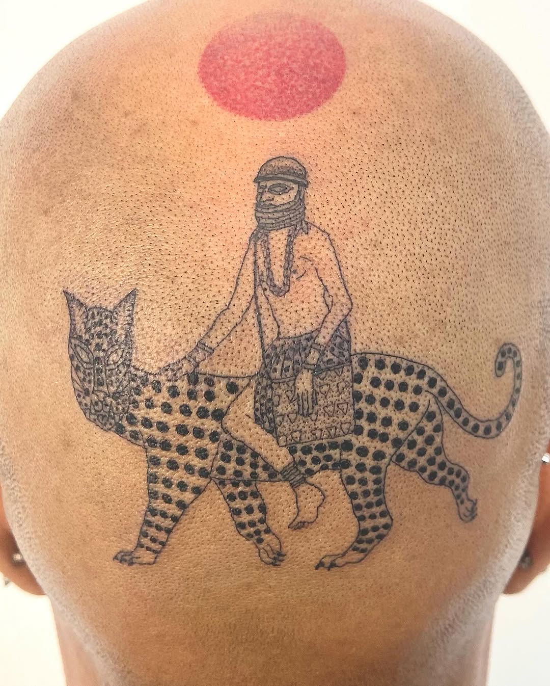 Tattoo by @geisha_ocelotl — illustrative, dotwork