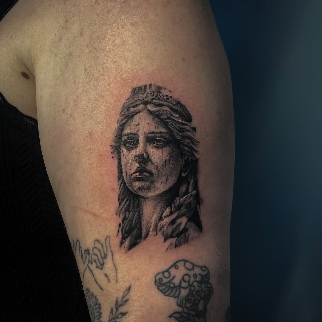 Tattoo by @mourning.tattoos — realism, black_and_grey