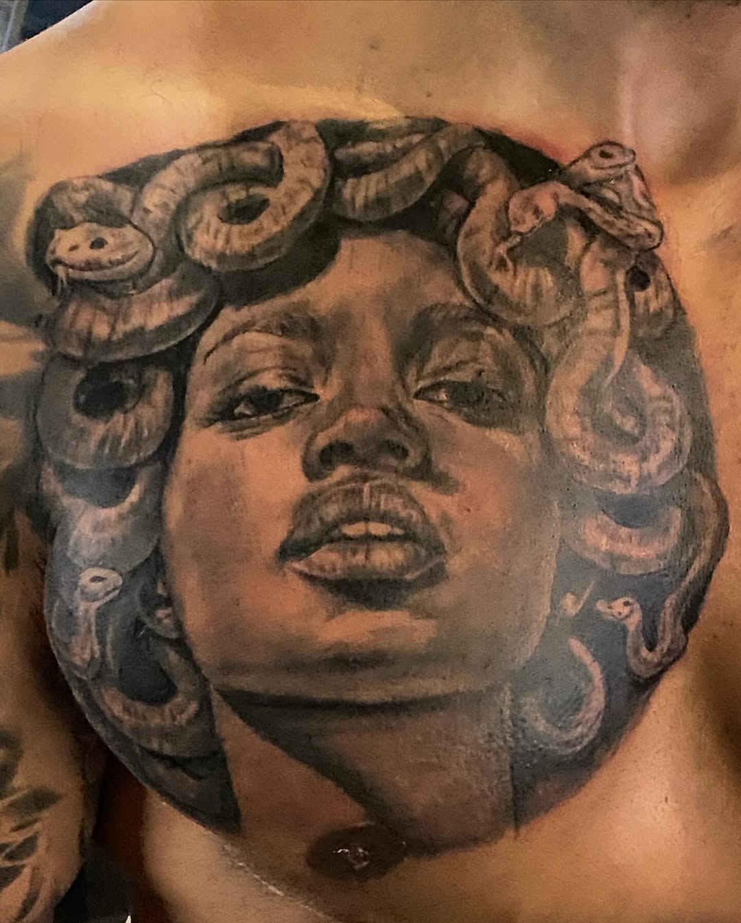 Tattoo by @moving_muralsart โ realism, black_and_grey