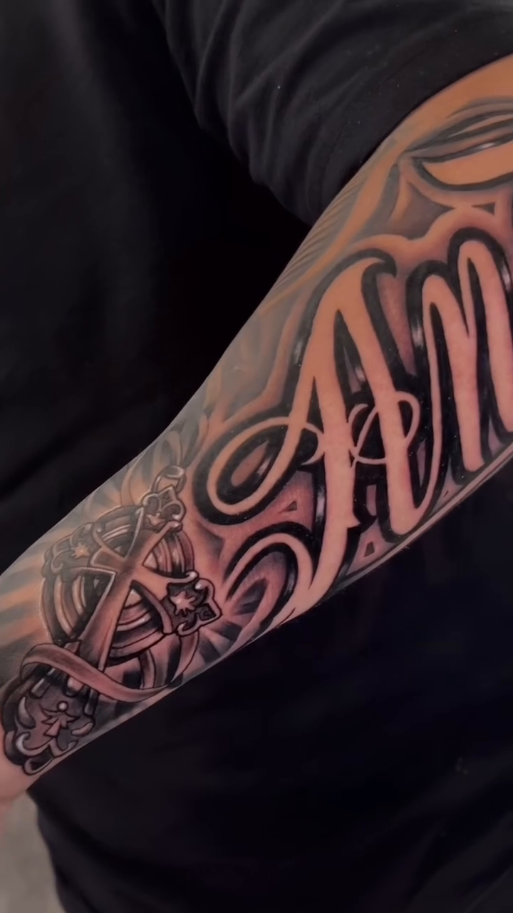 Tattoo by @stheve_blessed — lettering_script, black_and_grey