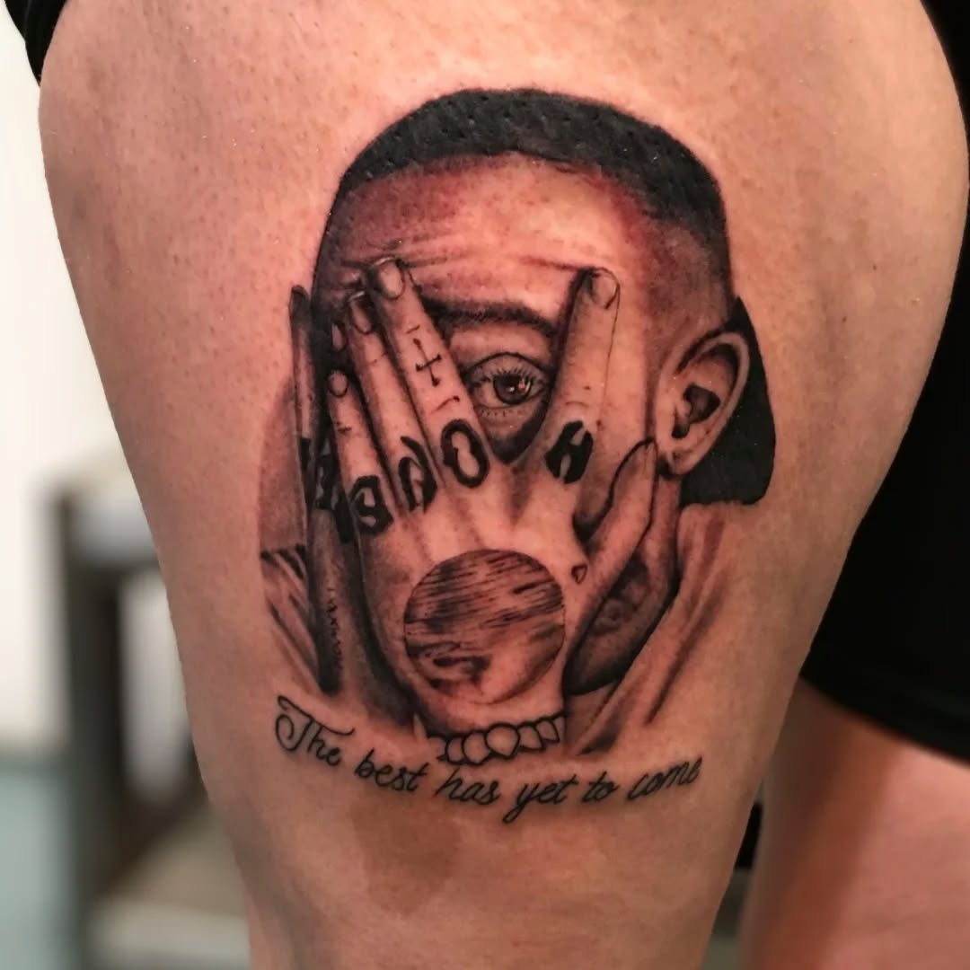Tattoo by @rando_rad — realism, black_and_grey