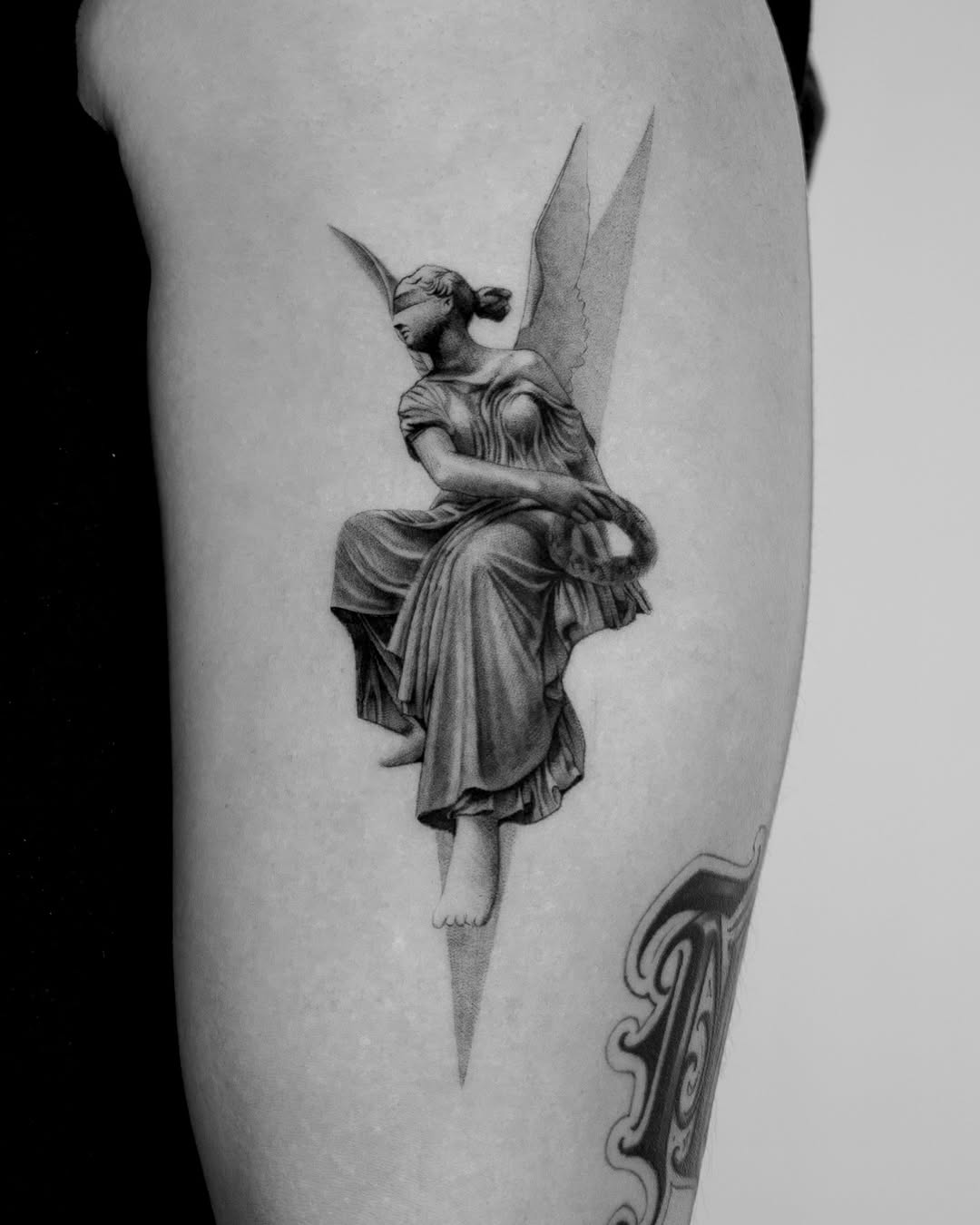 Tattoo by @lai.ink_ — realism, black_and_grey