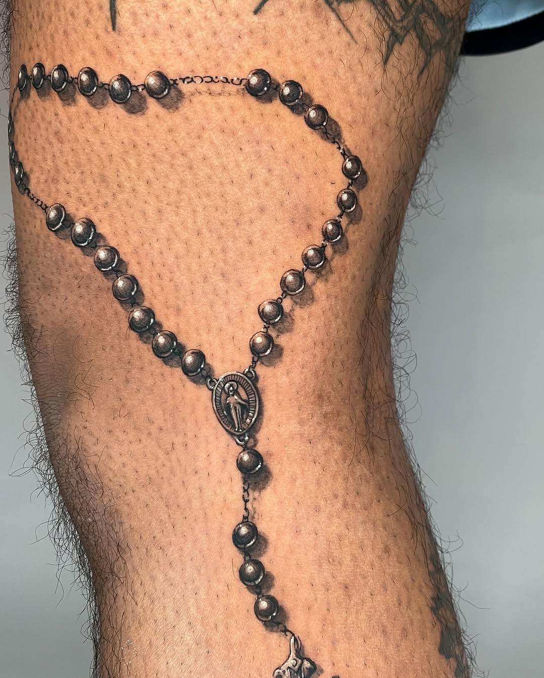 Tattoo by @tahinos.tattoo โ realism, black_and_grey