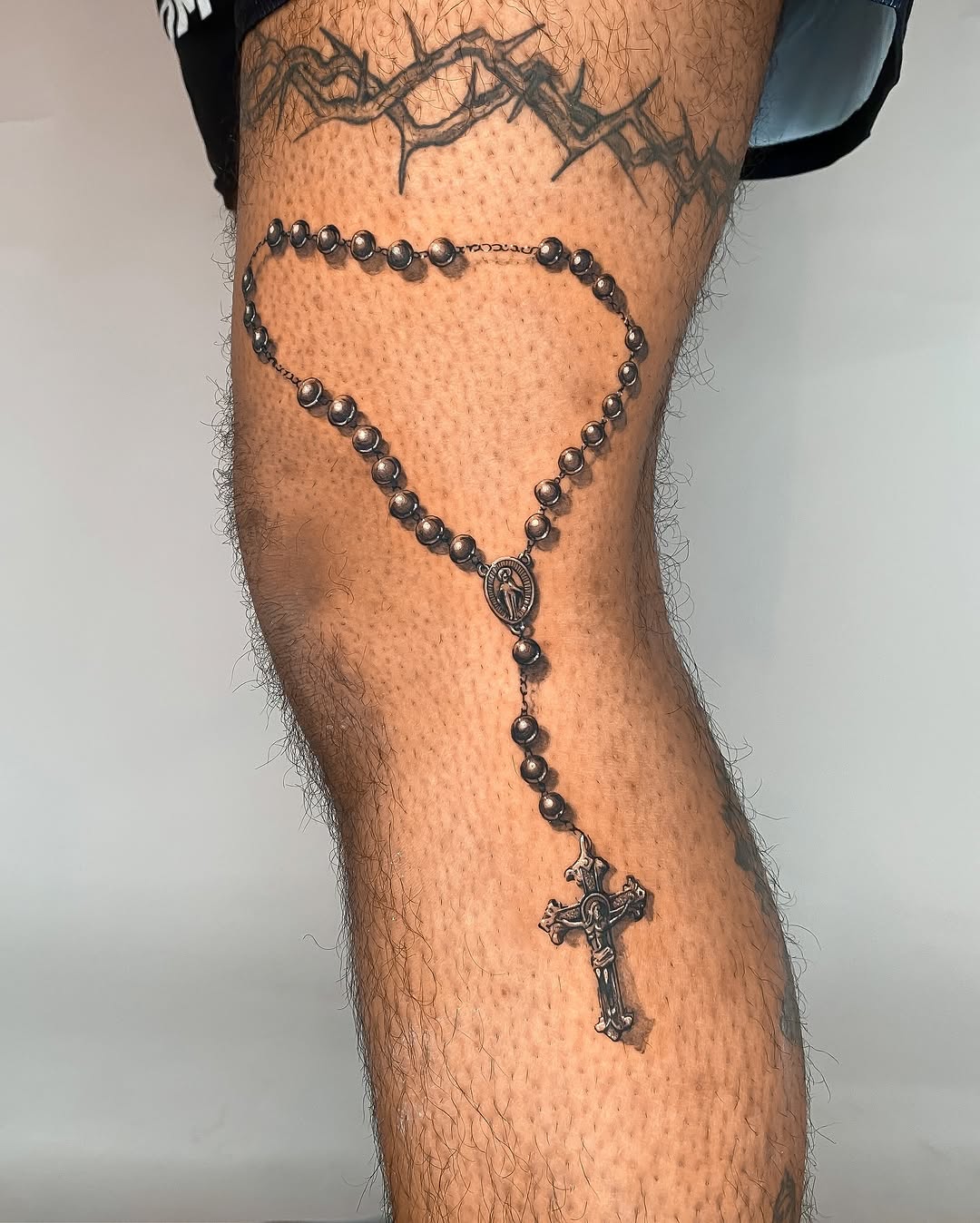 Tattoo by @tahinos.tattoo โ realism, black_and_grey