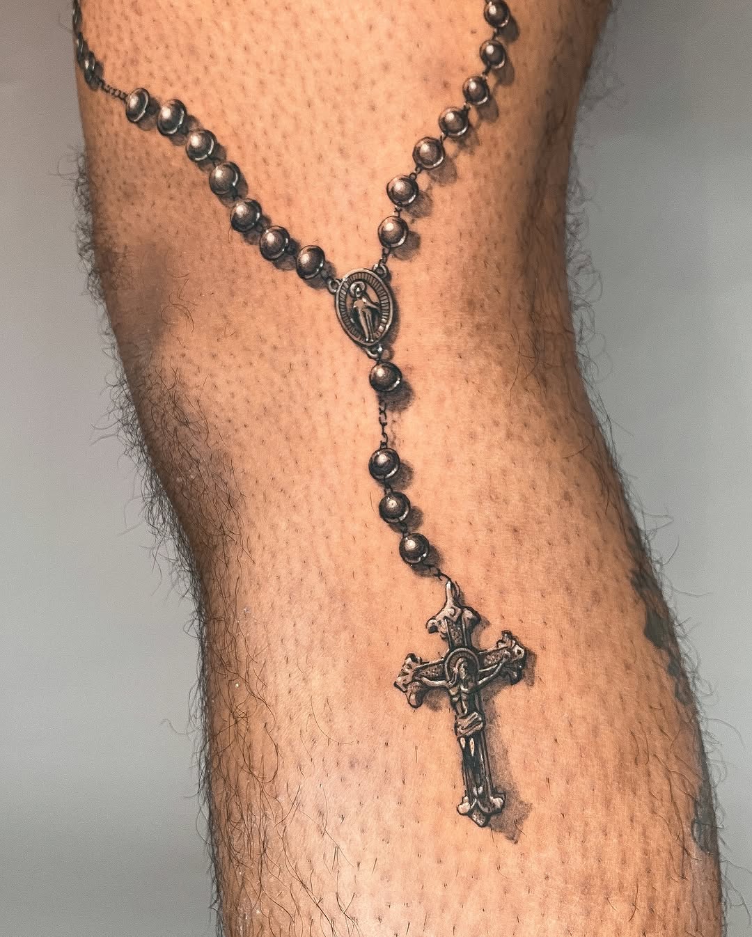 Tattoo by @tahinos.tattoo โ realism, black_and_grey