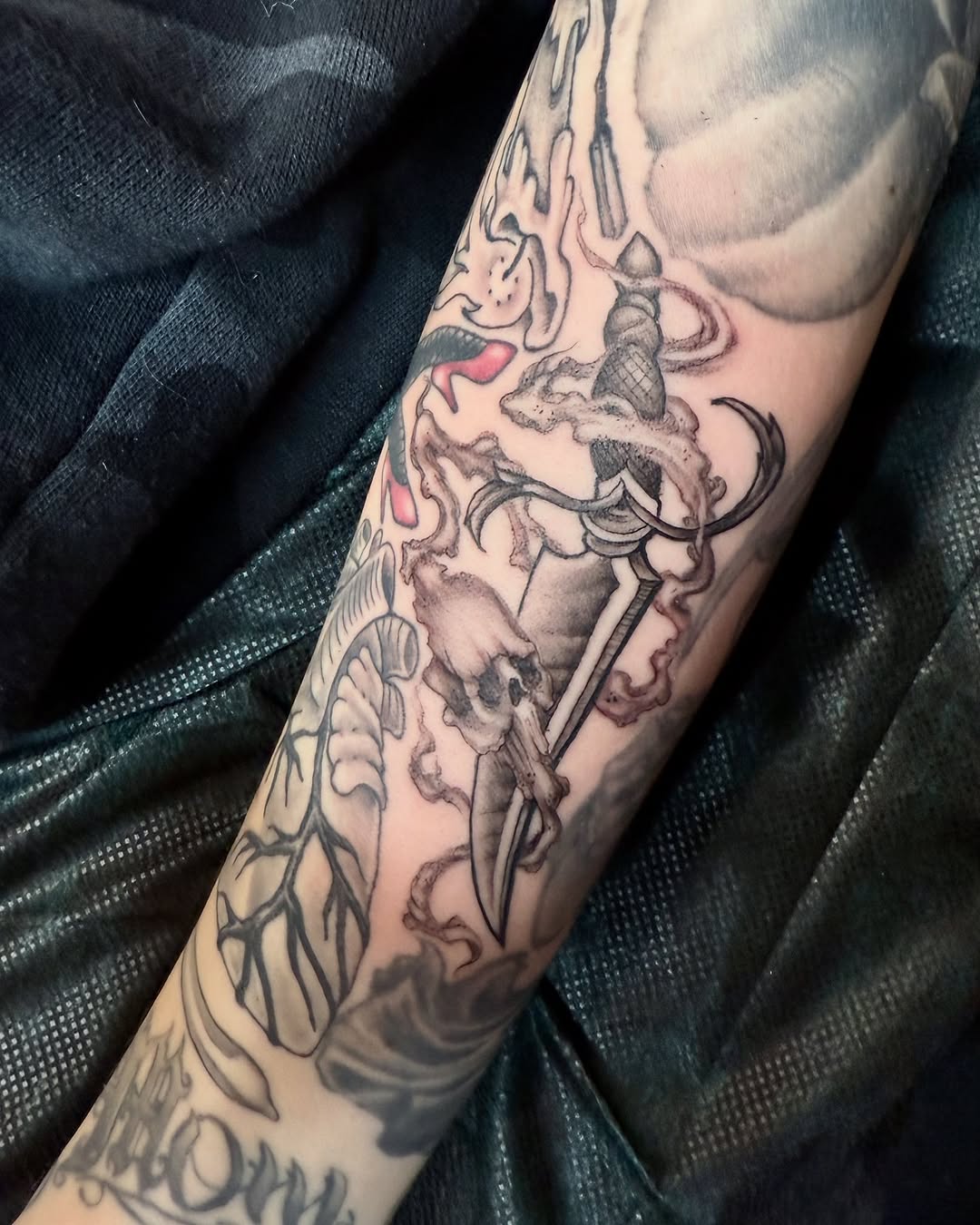 Tattoo by @omaredmisontattooer — black_and_grey, dark_realism