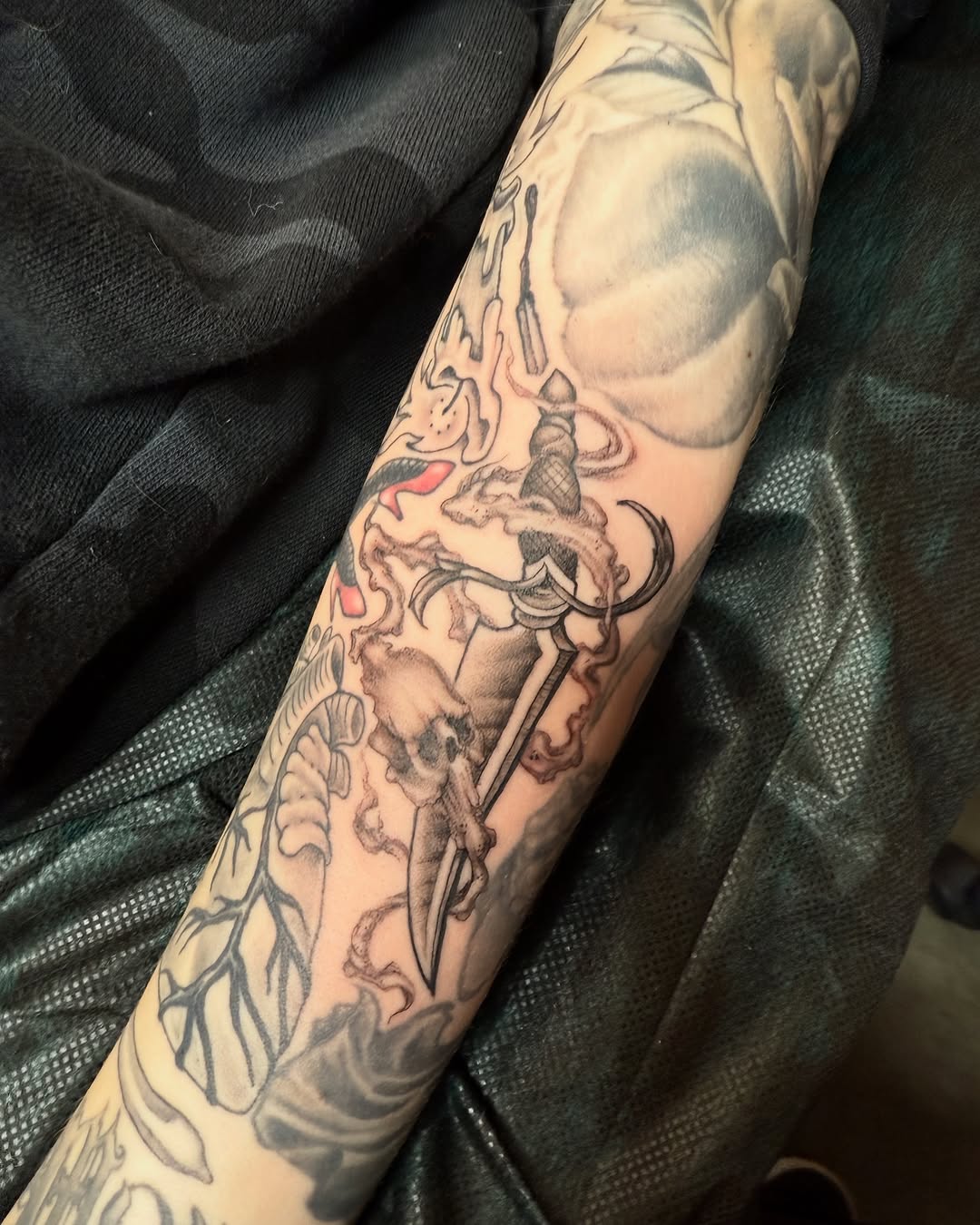 Tattoo by @omaredmisontattooer — black_and_grey, dark_realism