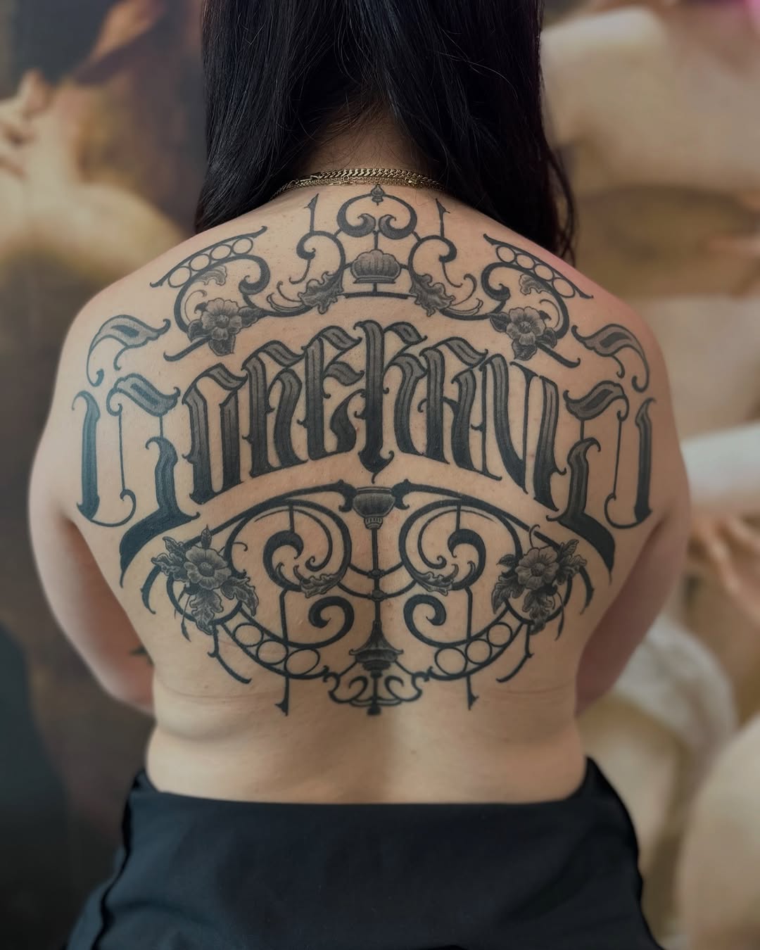Tattoo by @deft_ink — lettering_script, ornamental
