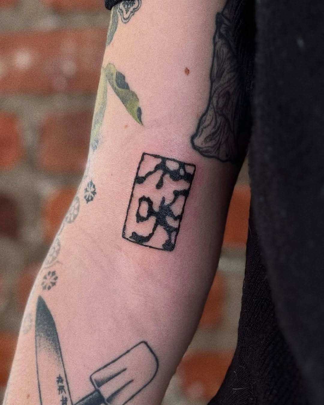 Tattoo by @sankangstudio — illustrative, blackwork