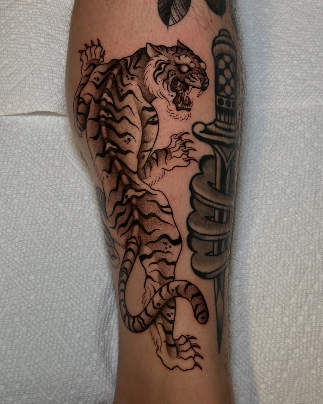 Tattoo by @carlosthebarloswarlos_ — american_traditional, black_and_grey