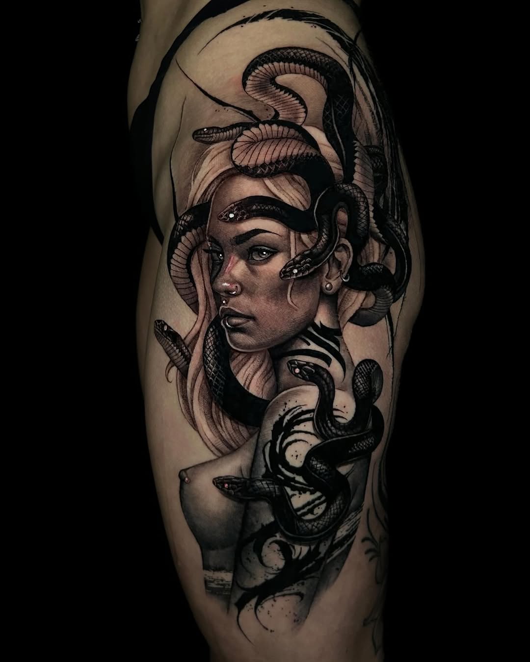 Tattoo by @laurav.tattoo — realism, black_and_grey