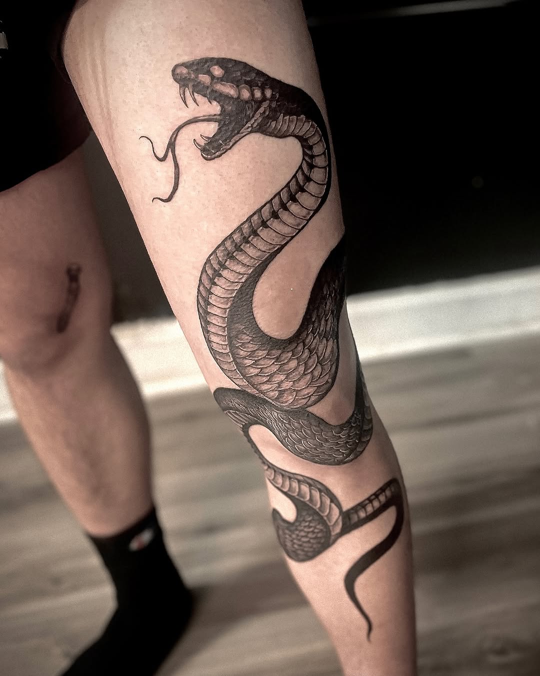 Tattoo by @joy.tatts — realism, black_and_grey