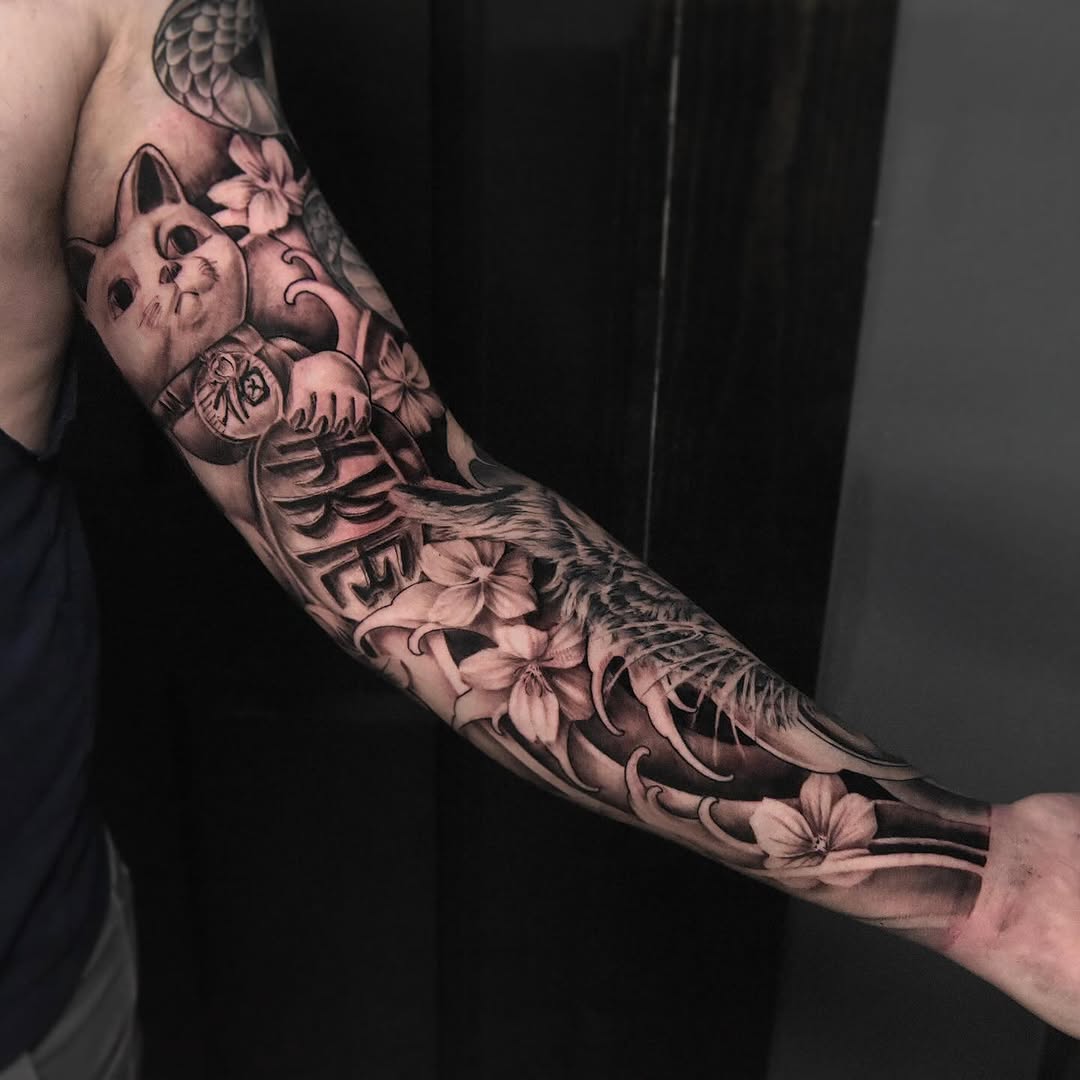Tattoo by @dan_logan_tattoo — japanese_irezumi, black_and_grey
