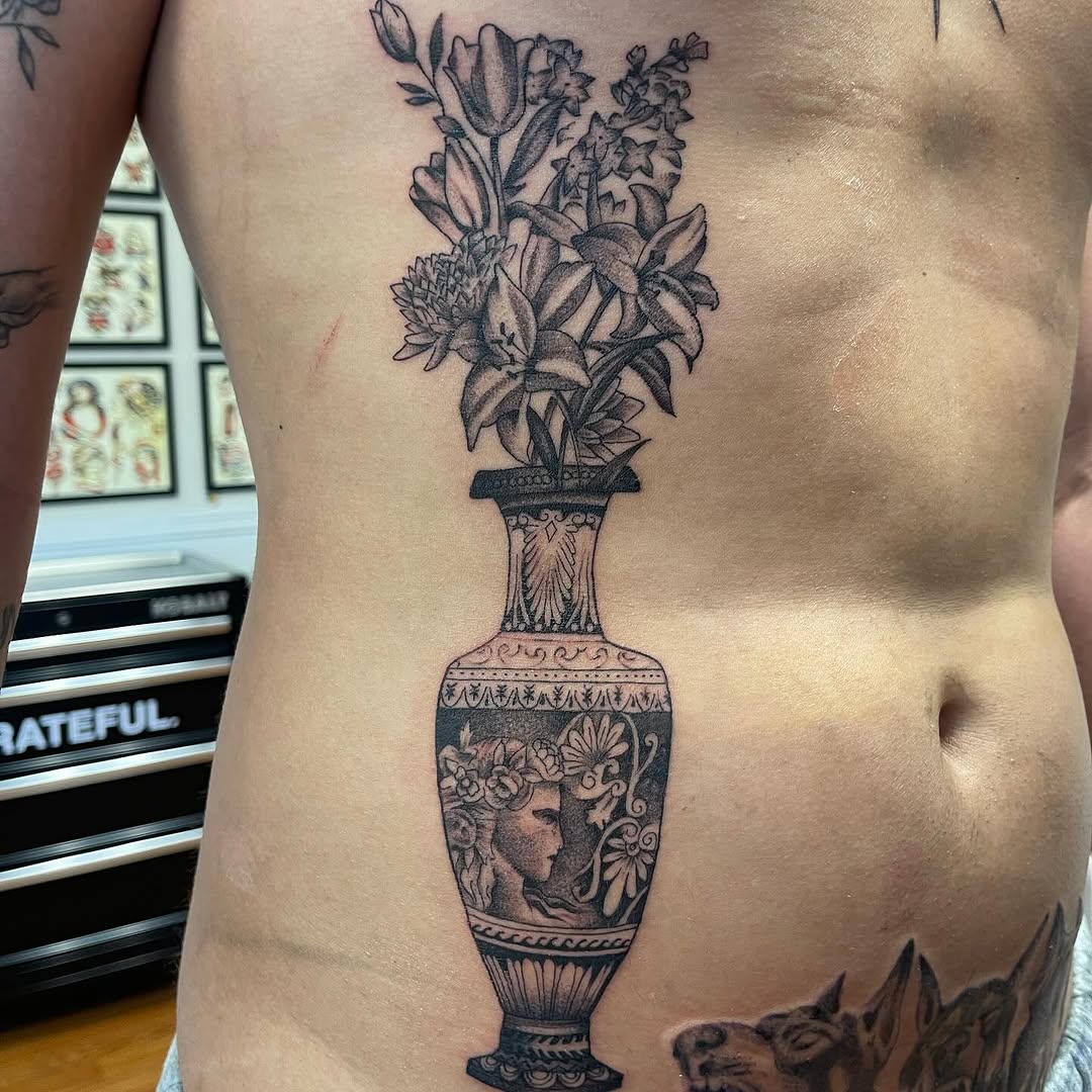 Tattoo by @tobiaztattooz — black_and_grey, realism