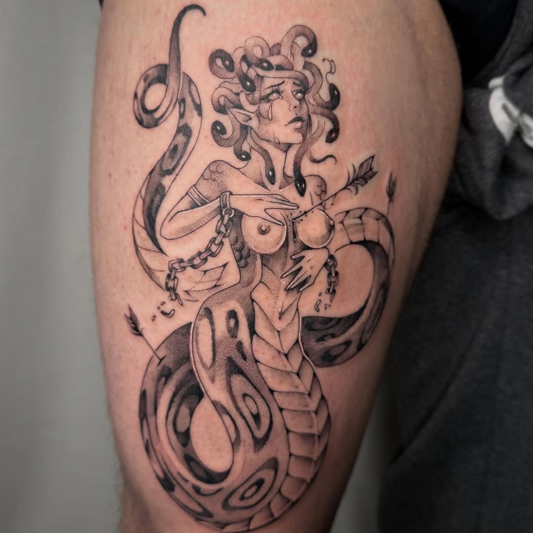 Tattoo by @mezzo.tattoo — dark_realism, black_and_grey