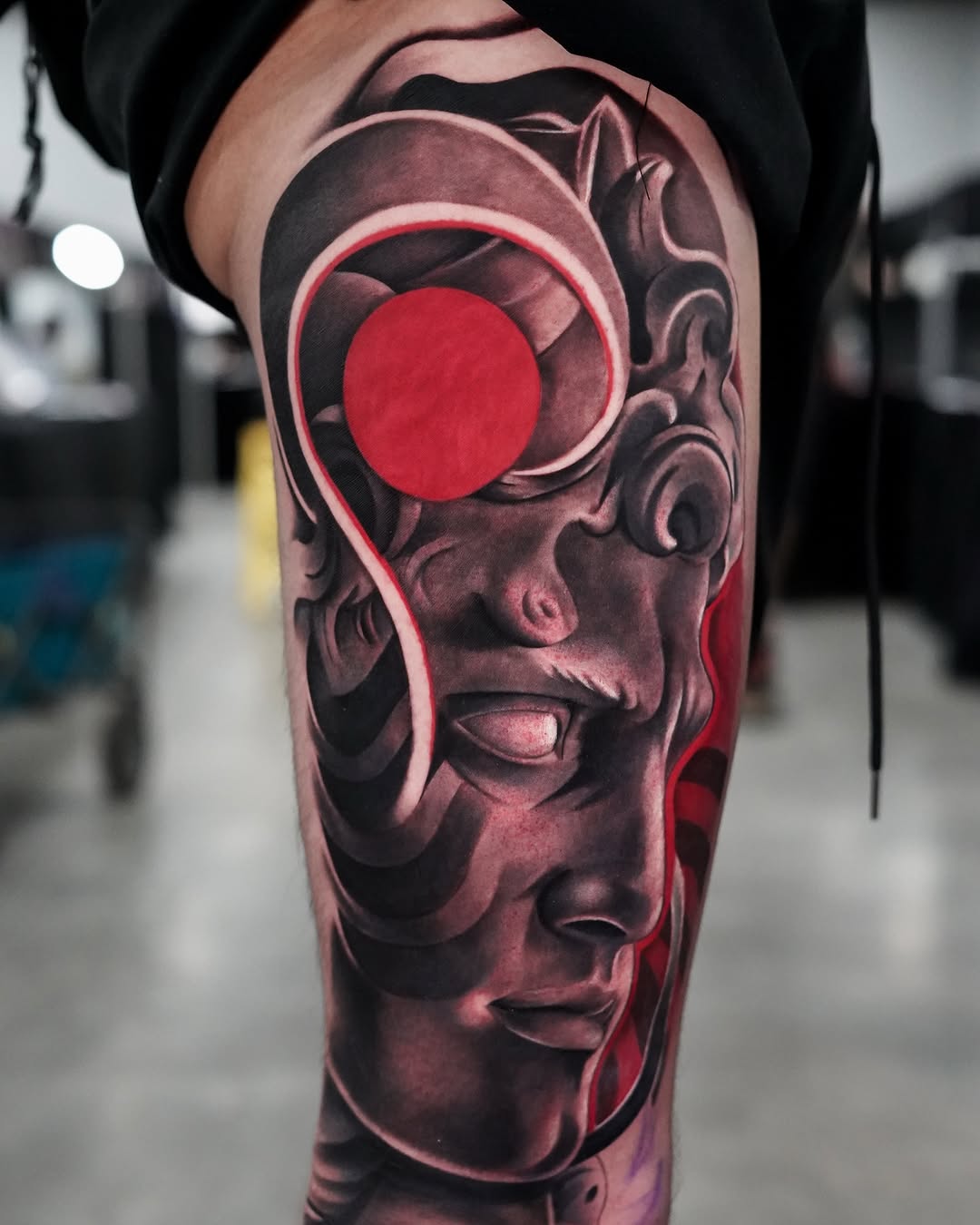 Tattoo by @alecx.inked โ realism, black_and_grey