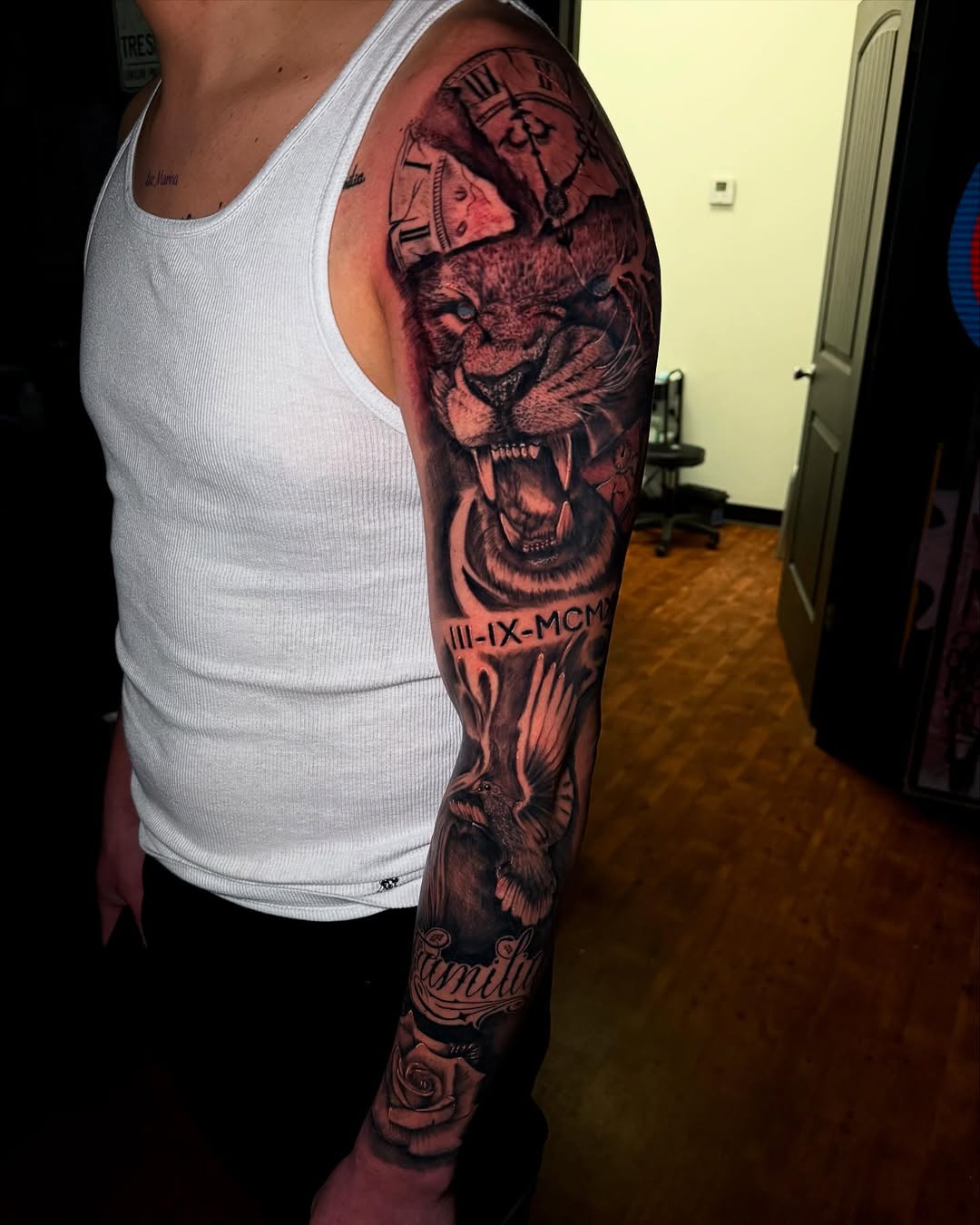Tattoo by @rex.ink98 — realism, black_and_grey