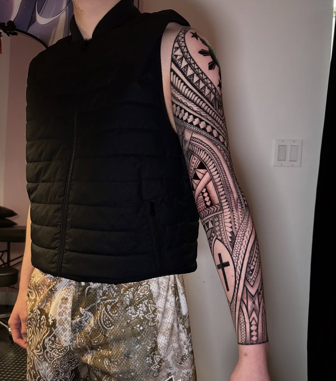 Tattoo by @ivyleetattoo — tribal, blackwork