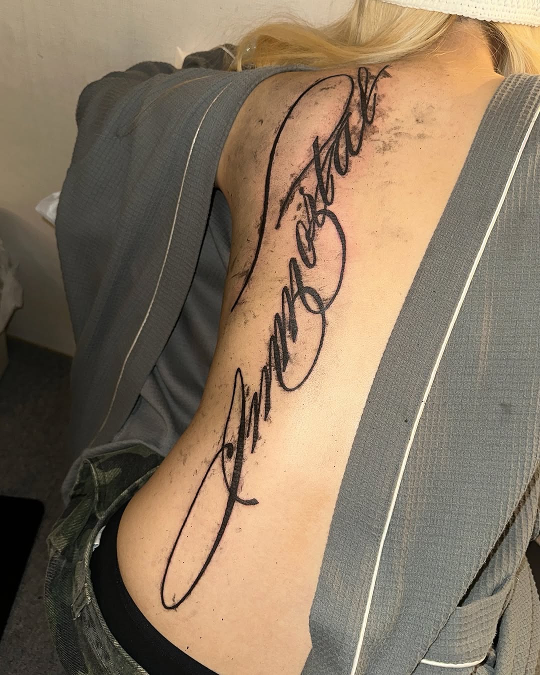 Tattoo by @eyeballism___ — lettering_script
