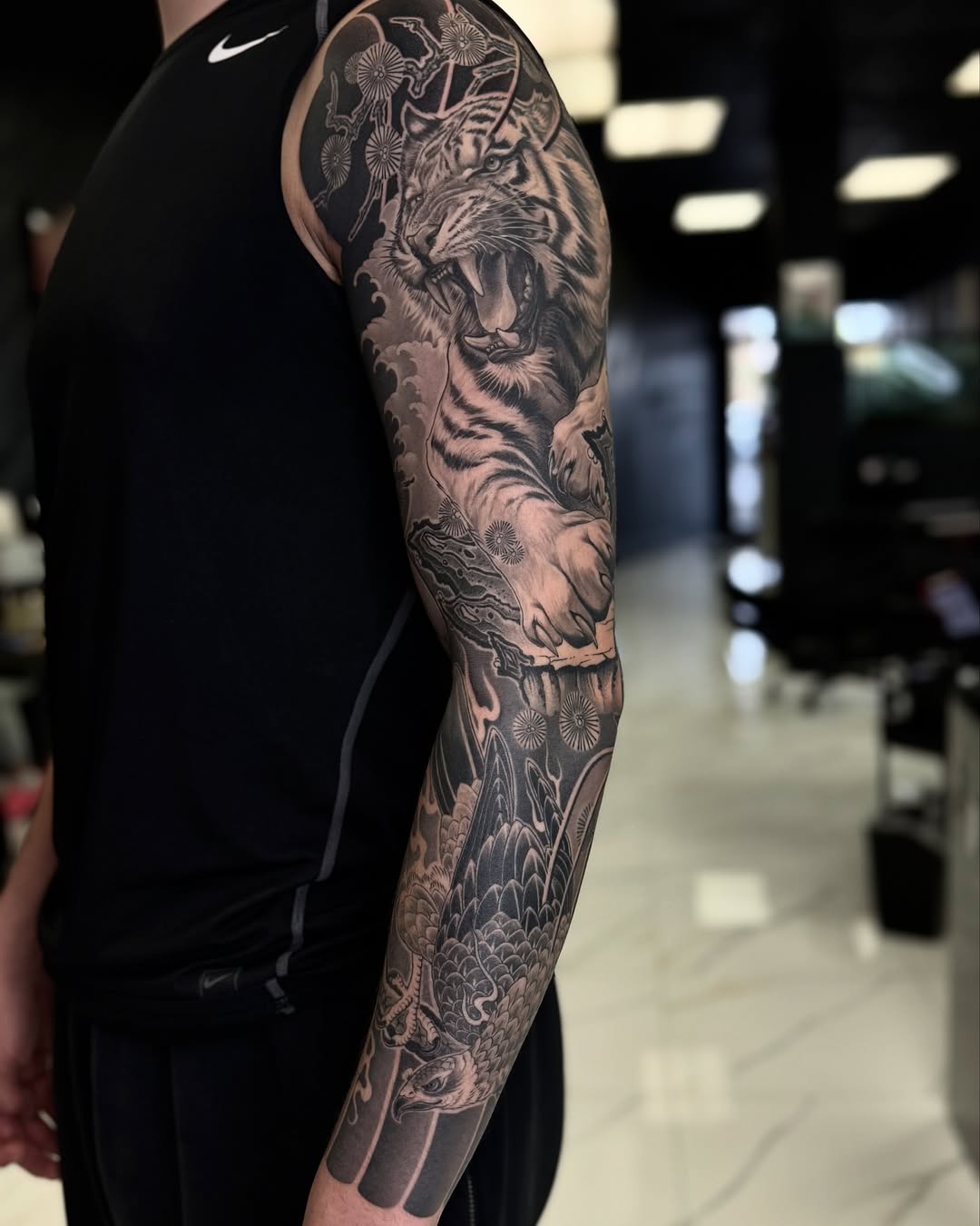 Tattoo by @tuannguyen_tattoo — japanese_irezumi, black_and_grey