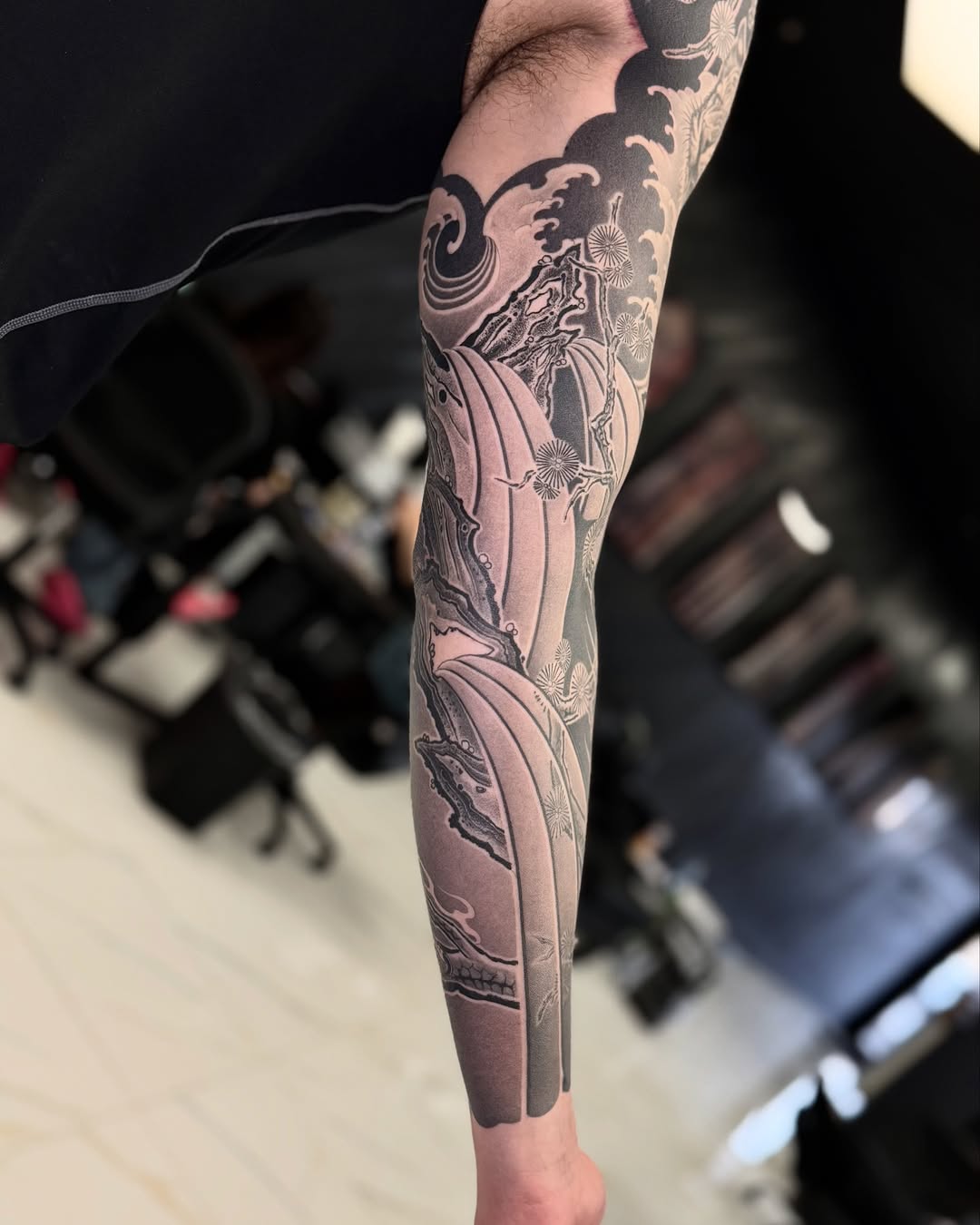 Tattoo by @tuannguyen_tattoo — japanese_irezumi, black_and_grey