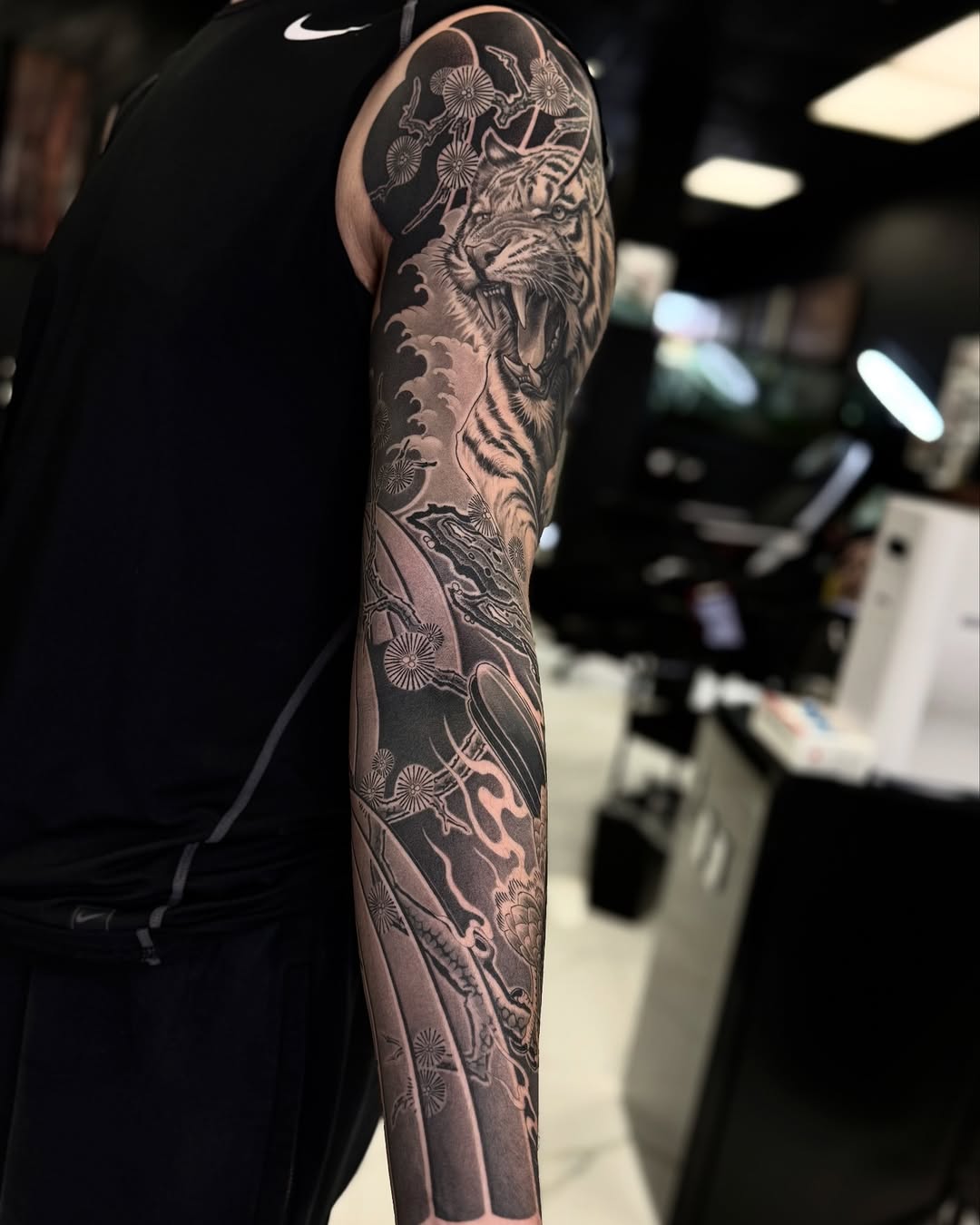 Tattoo by @tuannguyen_tattoo — japanese_irezumi, black_and_grey