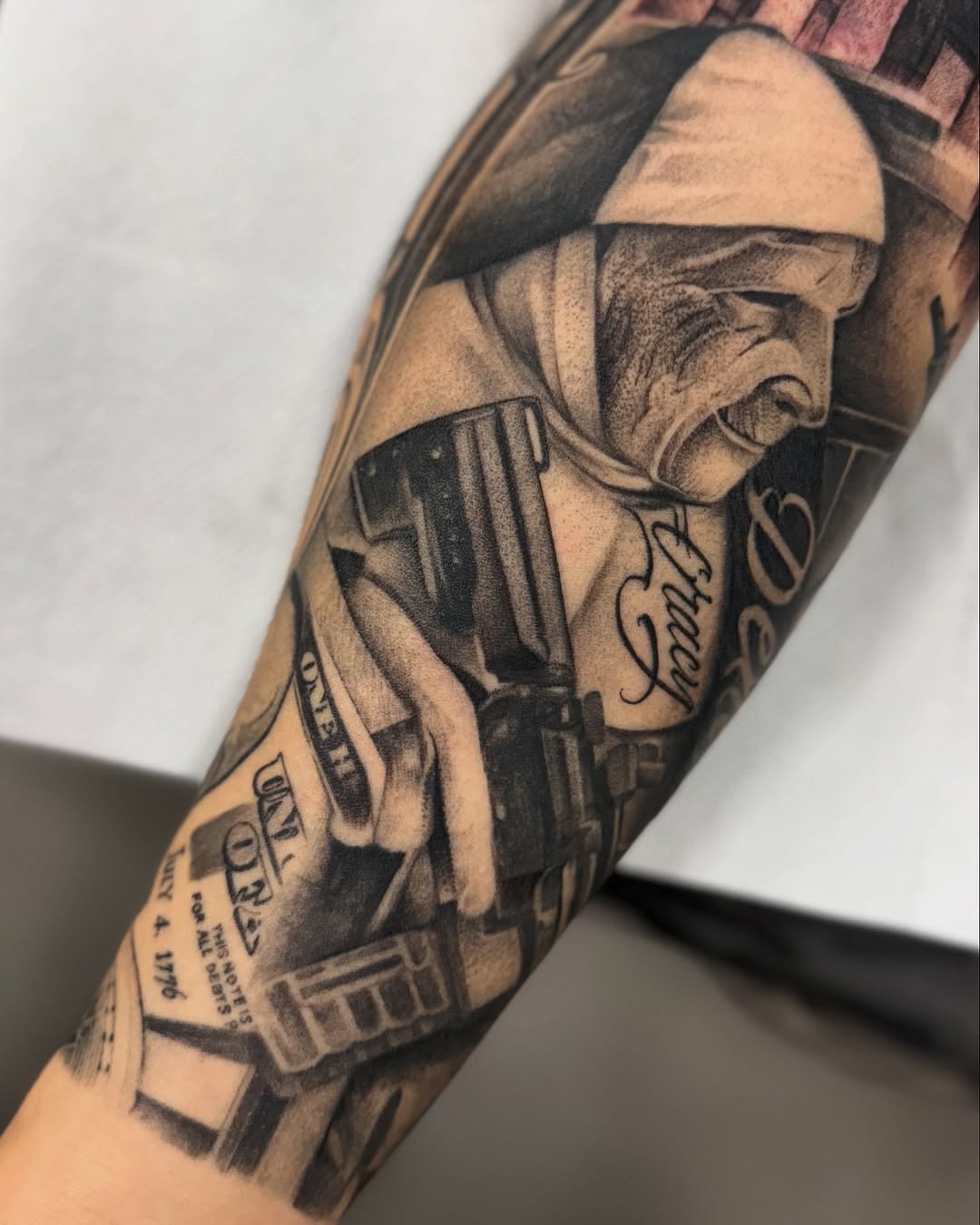 Tattoo by @dopeletterstattoo — realism, black_and_grey