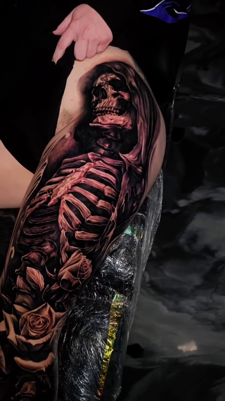Tattoo by @nathan.matherstattooist — dark_realism, black_and_grey