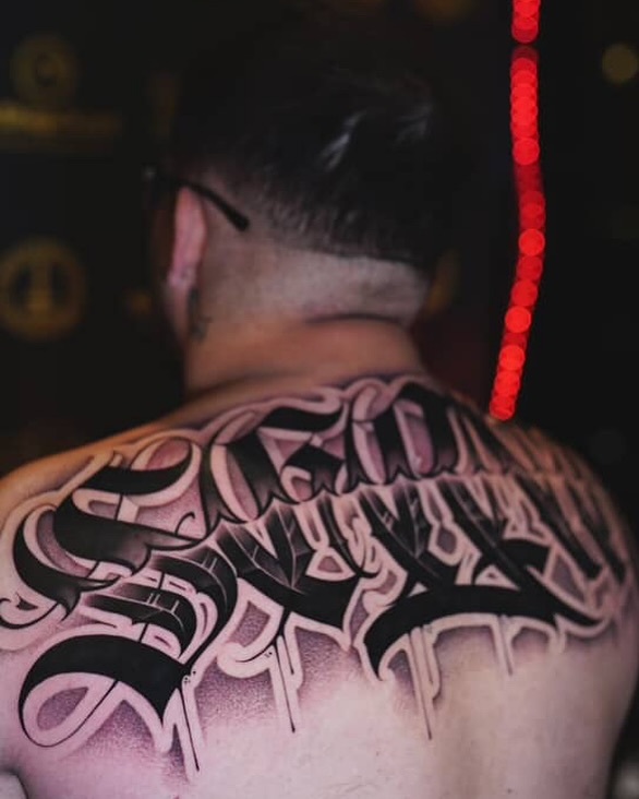 Tattoo by @aleckzi_ramos — lettering_script, chicano