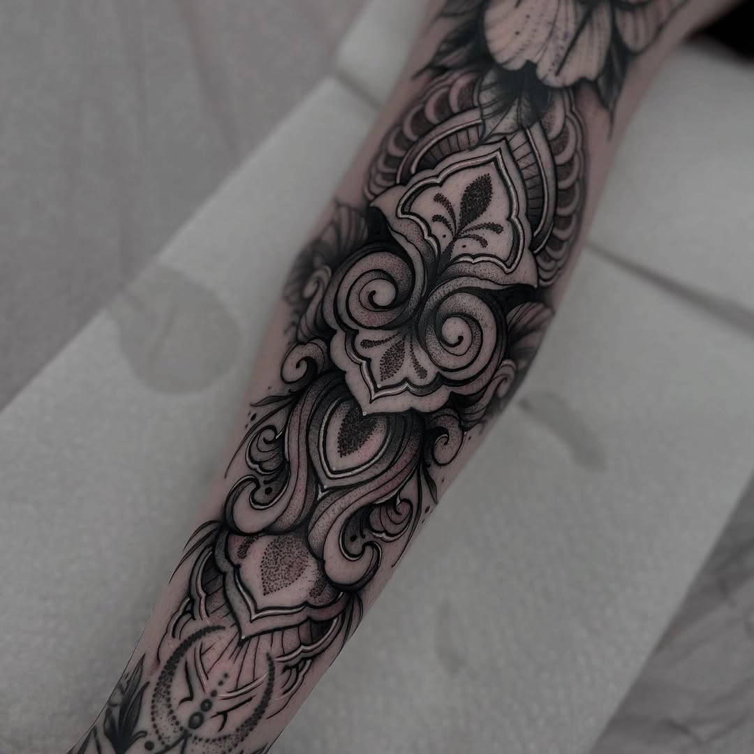 Tattoo by @slim_reaper_tattoos — ornamental, dotwork